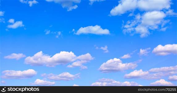 Blue sky with light cumulus clouds - panoramic view