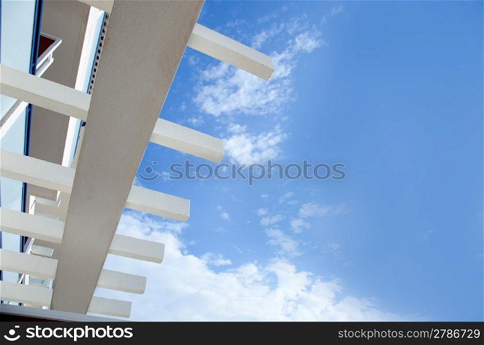 Blue sky with mediterranean white beams architecture detail