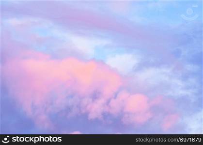 blue sky with pastel pink clouds