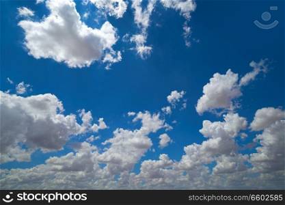 Blue sky with summer cumulus clouds