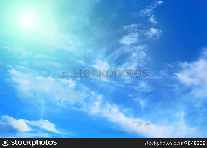 Blue sky with white clouds and sunlight natural background