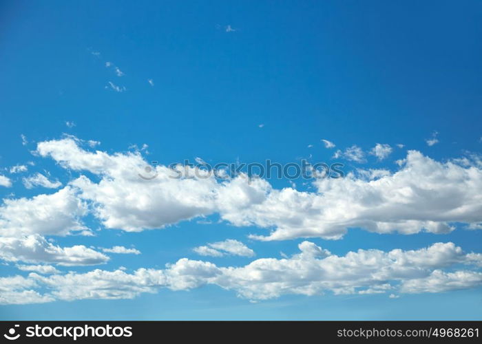 Blue sky with white clouds background