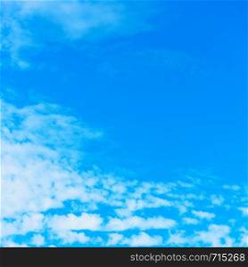 Blue sky with white clouds - Background with space for text