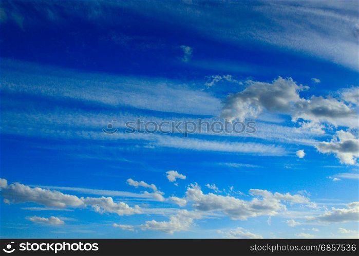 blue sky with white clouds. beautiful white clouds on blue sky background. White clouds on the summer sky