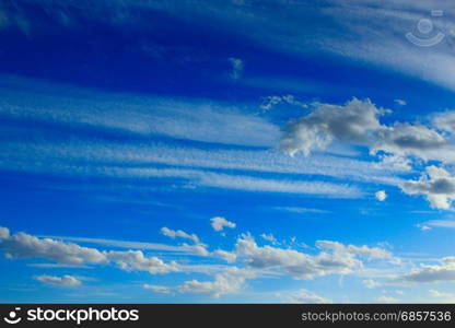 blue sky with white clouds. beautiful white clouds on blue sky background. White clouds on the summer sky