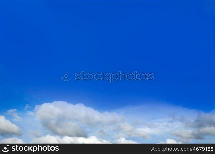 Blue sky with white clouds in a sunny summer day