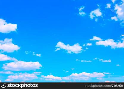 Blue sky with white clouds, may be used as background