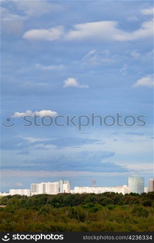 blue sky with white clouds under autumn city