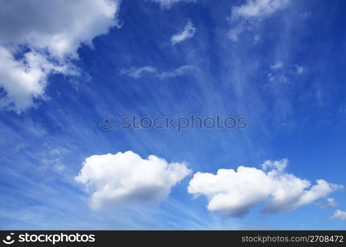 Blue sky with white cumulus clouds