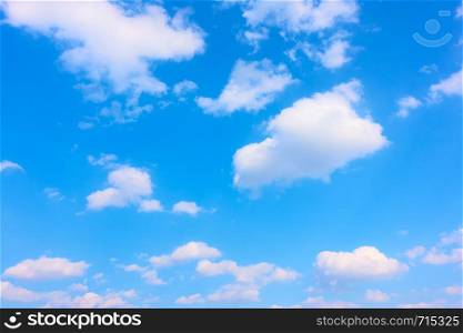 Blue sky with white heap clouds, may be used as background