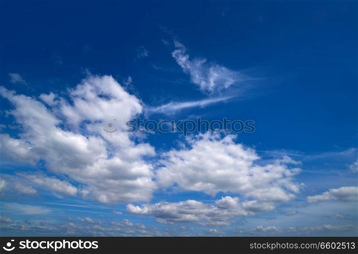 Blue sky with white summer cumulus clouds