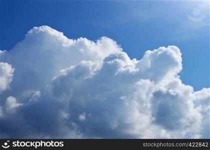 Blue skylight and fluffy cloud. Composition of nature.