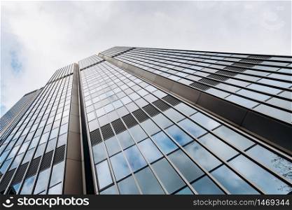 Blue skyscraper facade. office buildings. modern glass silhouettes