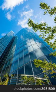 Blue skyscraper facade. office buildings. modern glass silhouettes of skyscrapers