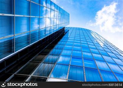 Blue skyscraper facade. office buildings. modern glass silhouettes of skyscrapers