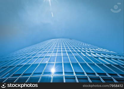 Blue skyscraper facade. office buildings. modern glass silhouettes of skyscrapers