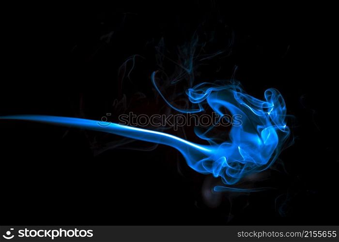 Blue smoke in the black abstract background. abstract background