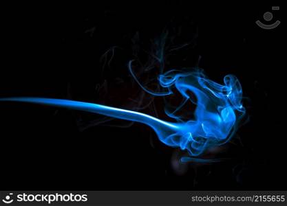 Blue smoke in the black abstract background. abstract background