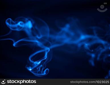 blue Smoke on black background , beautiful smoke,Fluffy Puffs of Smoke