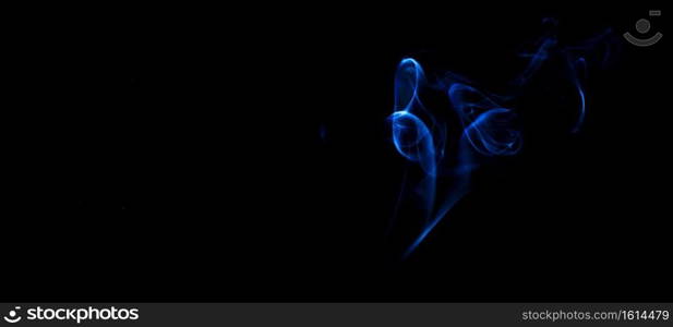 blue smoke on black background. fire design smoke on black background. fire design