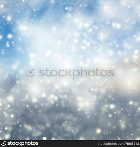 Blue Snow and Lights Festive background with light beams