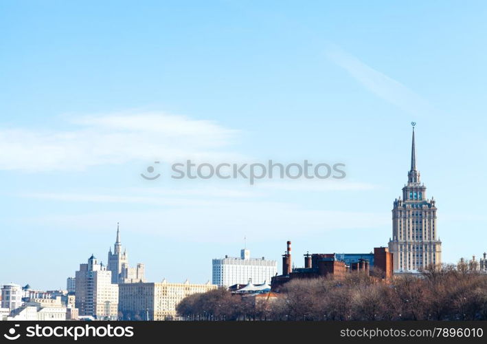 blue spring sky over Russian White House and skyscrapers in Moscow