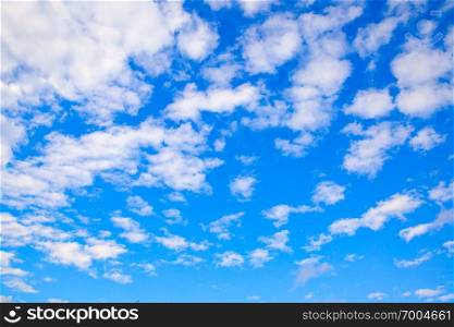 Blue spring sky with clouds - background, space for your own text