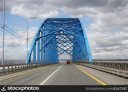 Blue steel bridge across the Yenisei River