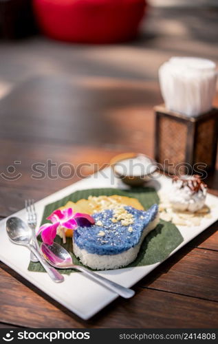 Blue sticky rice with sweet ripe mango. (Khao Nieow Ma Muang) Thai dessert.