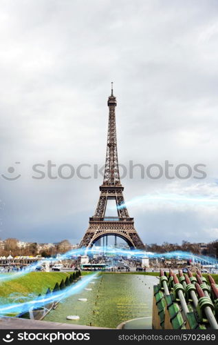 Blue streak of lights against Eiffel Tower