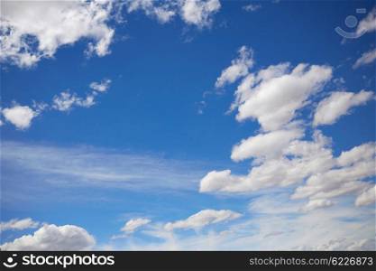 Blue summer sky in Mediterranean sea with white clouds