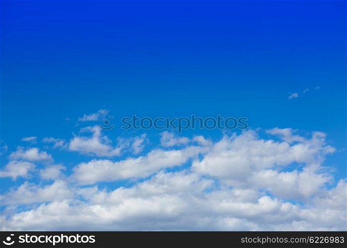 Blue summer sky in Mediterranean sea with white clouds