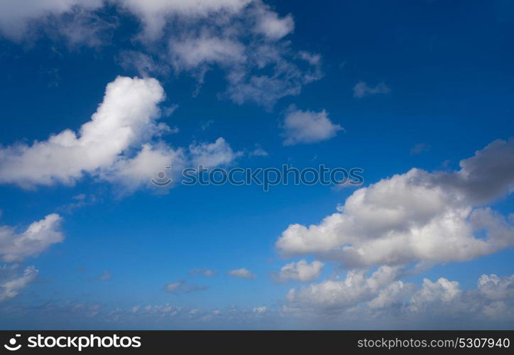 Blue summer sky white cumulus clouds background