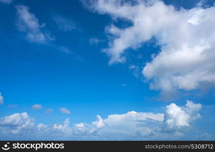 Blue summer sky white cumulus clouds background