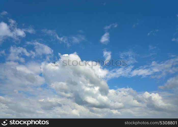 Blue summer sky white cumulus clouds background