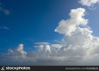 Blue summer sky white cumulus clouds background