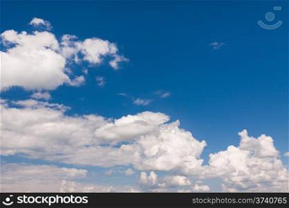 Blue summer sky with white clouds