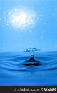 blue swirling water splash isolated on blue background