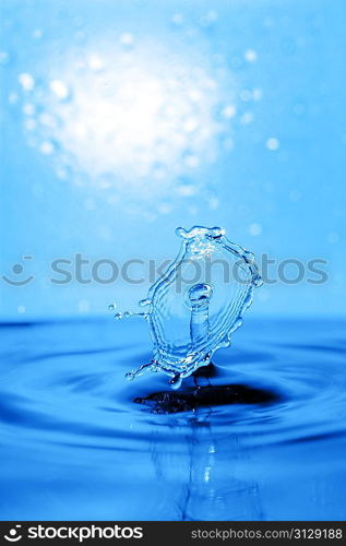 blue swirling water splash isolated on blue background