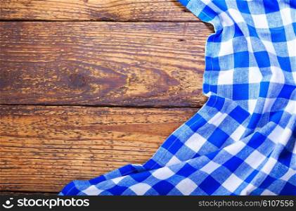 blue tablecloth on old wooden table