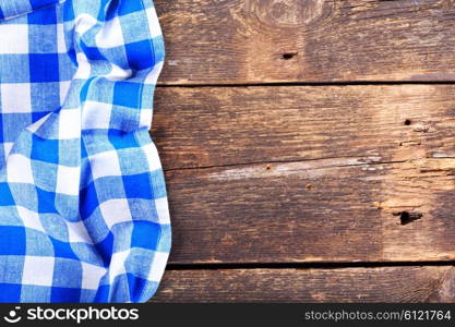 blue tablecloth on old wooden table