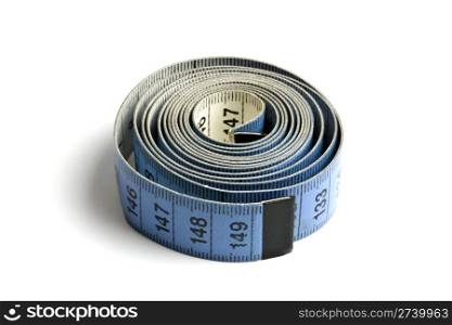Blue tape measure rolled on white background