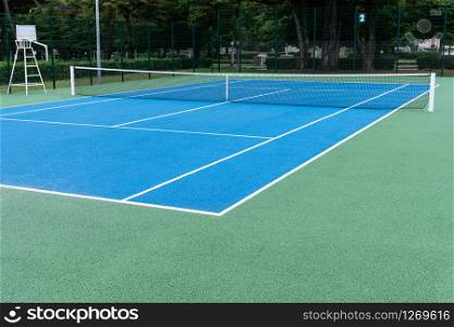 Blue Tennis court on Outdoor. Sports background. Copy space