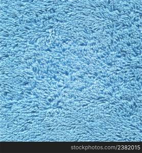 Blue terry fabric texture background. Blue cotton bath towel. Blue towel background