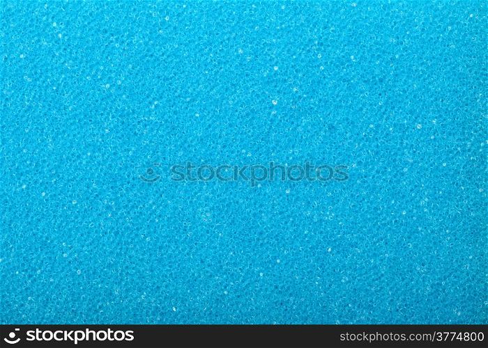 Blue texture cellulose foam sponge - background.