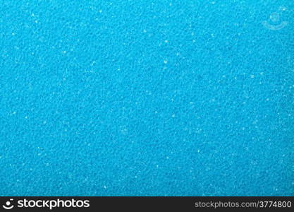 Blue texture cellulose foam sponge - background.