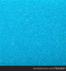 Blue texture cellulose foam sponge - background. Square format