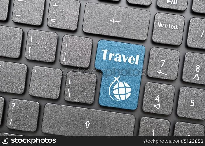 Blue travel key on keyboard