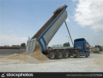 Blue Truck unload rocks