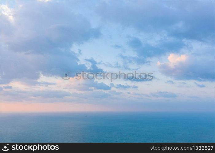 Blue turquoise seawater in summer season during travel holidays vacation trip. Dubai sea, UAE. Tourist attraction with blue cloud sky. Nature landscape background.